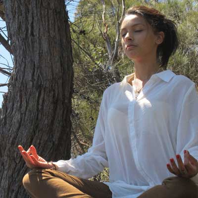 Radha meditating in nature